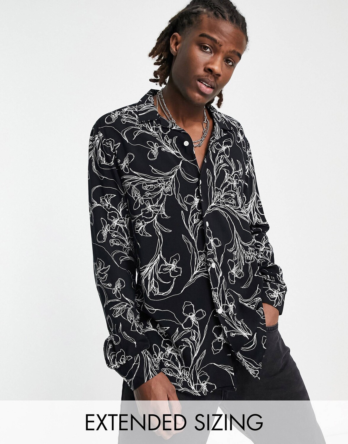 

Черная рубашка с цветочным принтом ASOS DESIGN revere