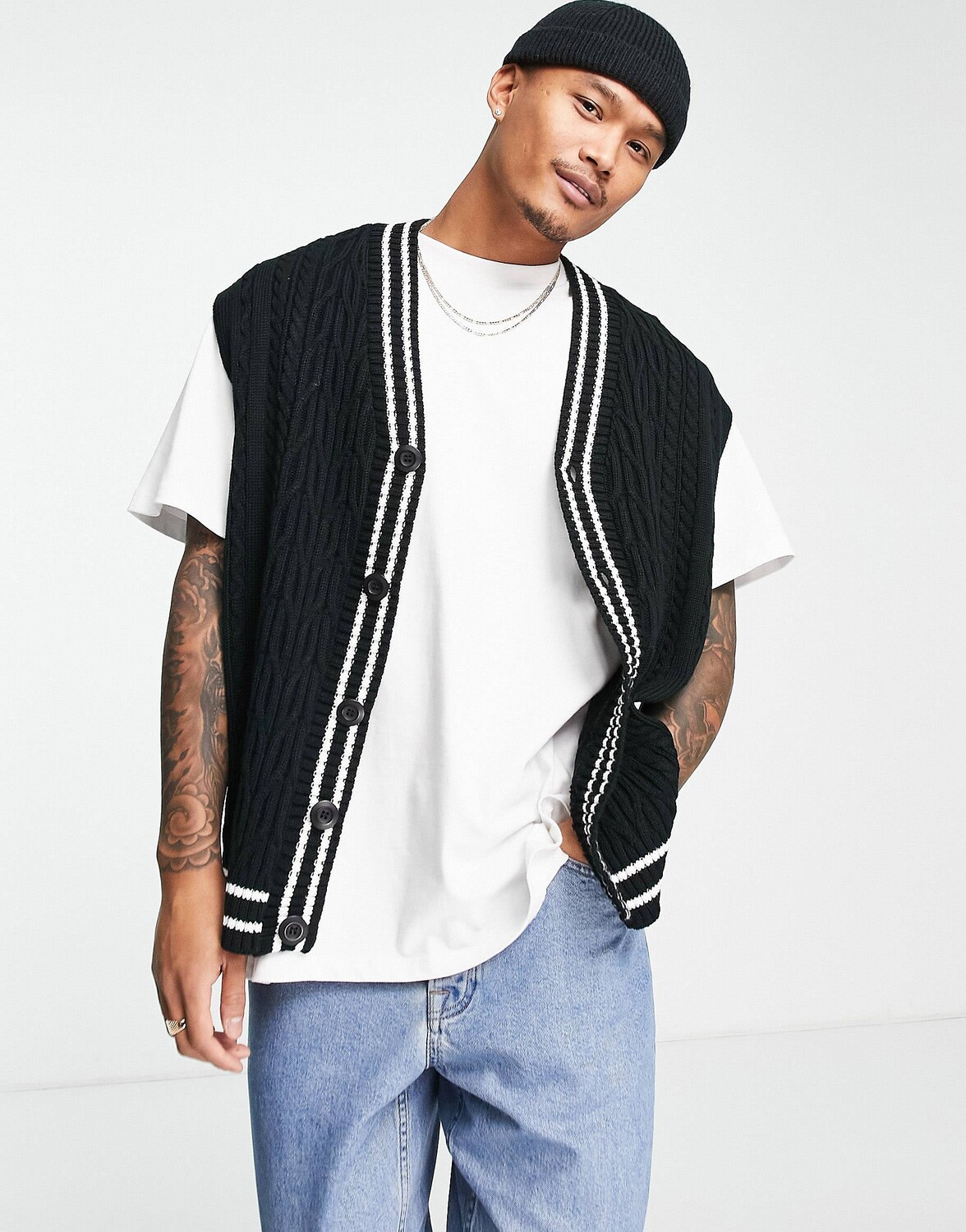

Черный вязаный свитер без рукавов в крикет ASOS DESIGN