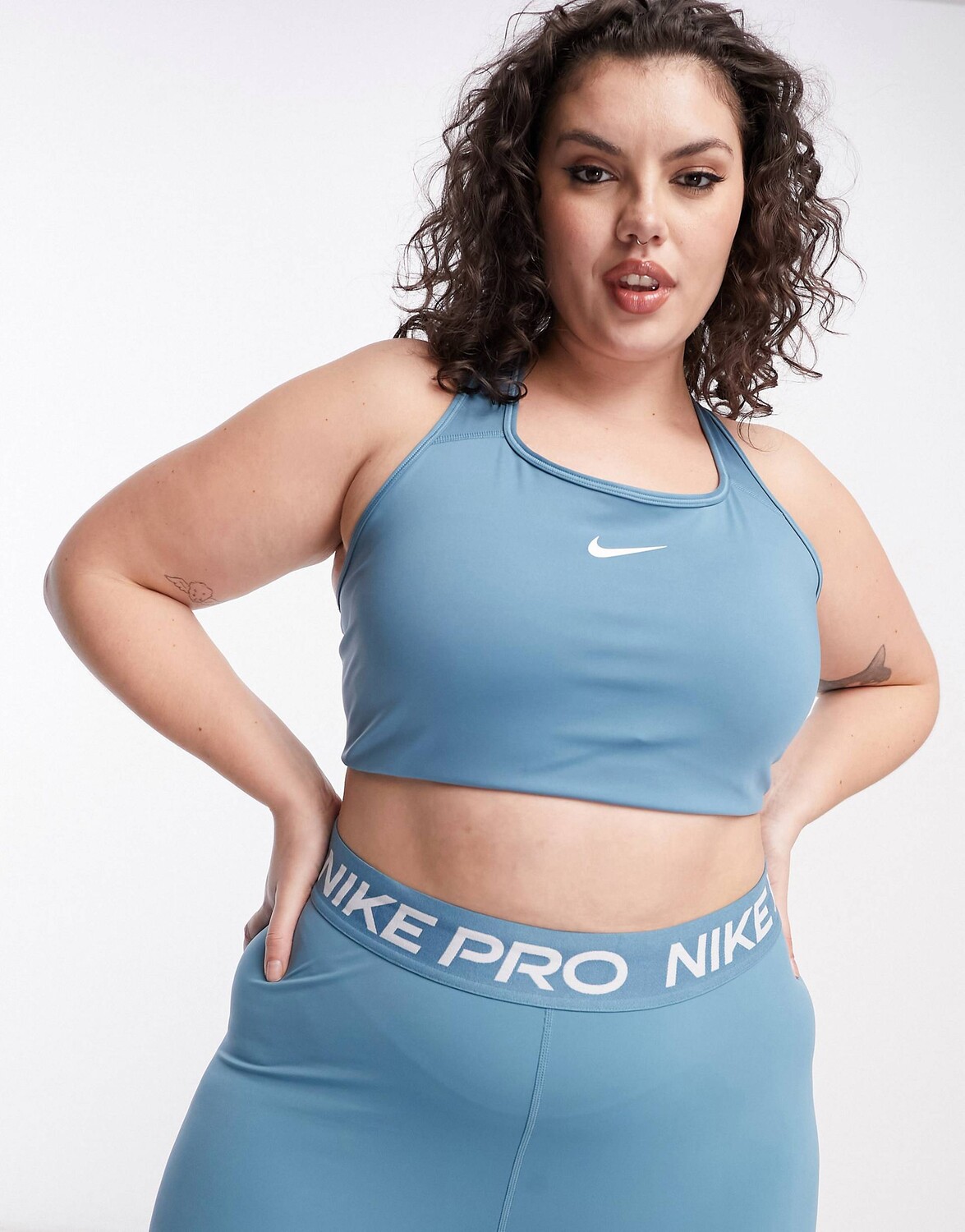 

Темно-синий бюстгальтер с подкладками Nike Training Swoosh Plus dri fit