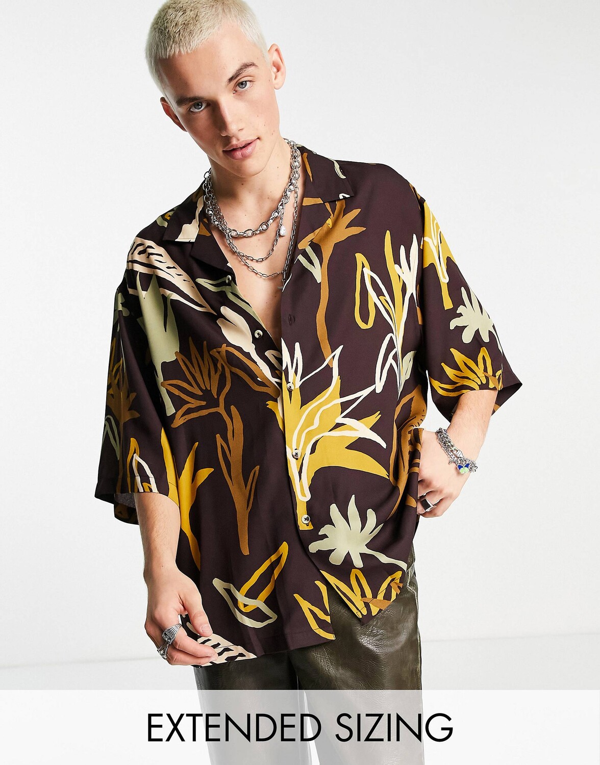 

Коричневая рубашка свободного кроя с цветочным принтом ASOS DESIGN