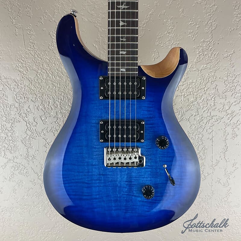 

PRS SE Custom 24 2021 — настоящее время — выцветшая синяя вспышка