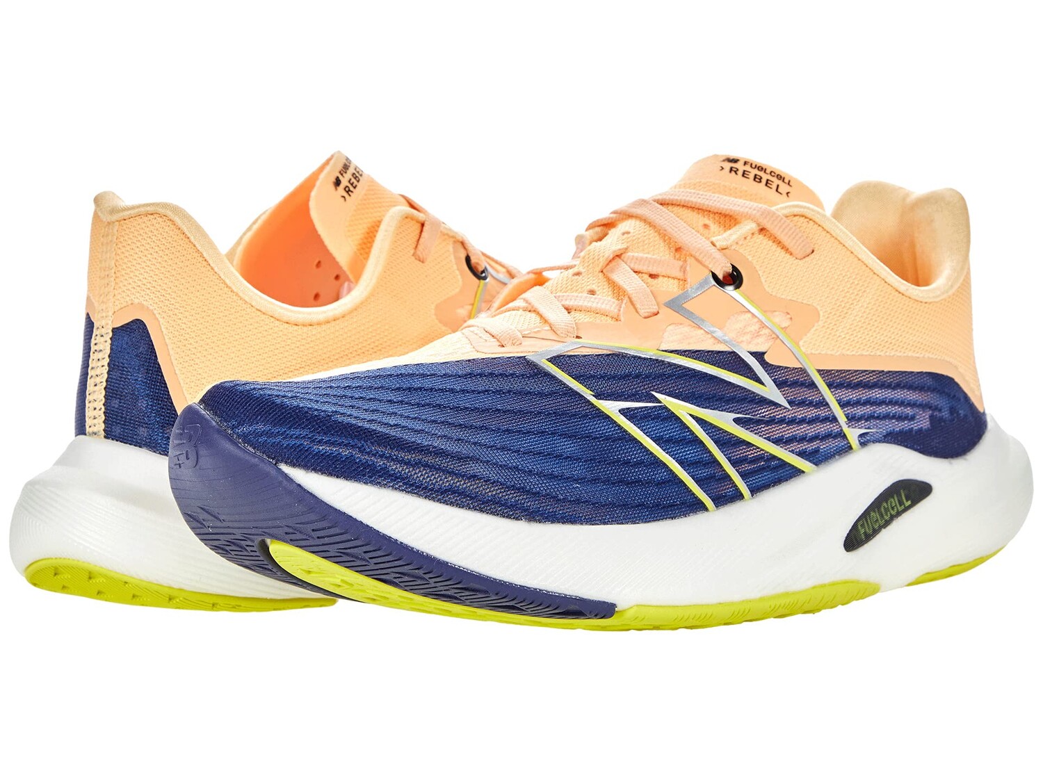 

Кроссовки New Balance FuelCell Rebel v2, оранжевый/синий