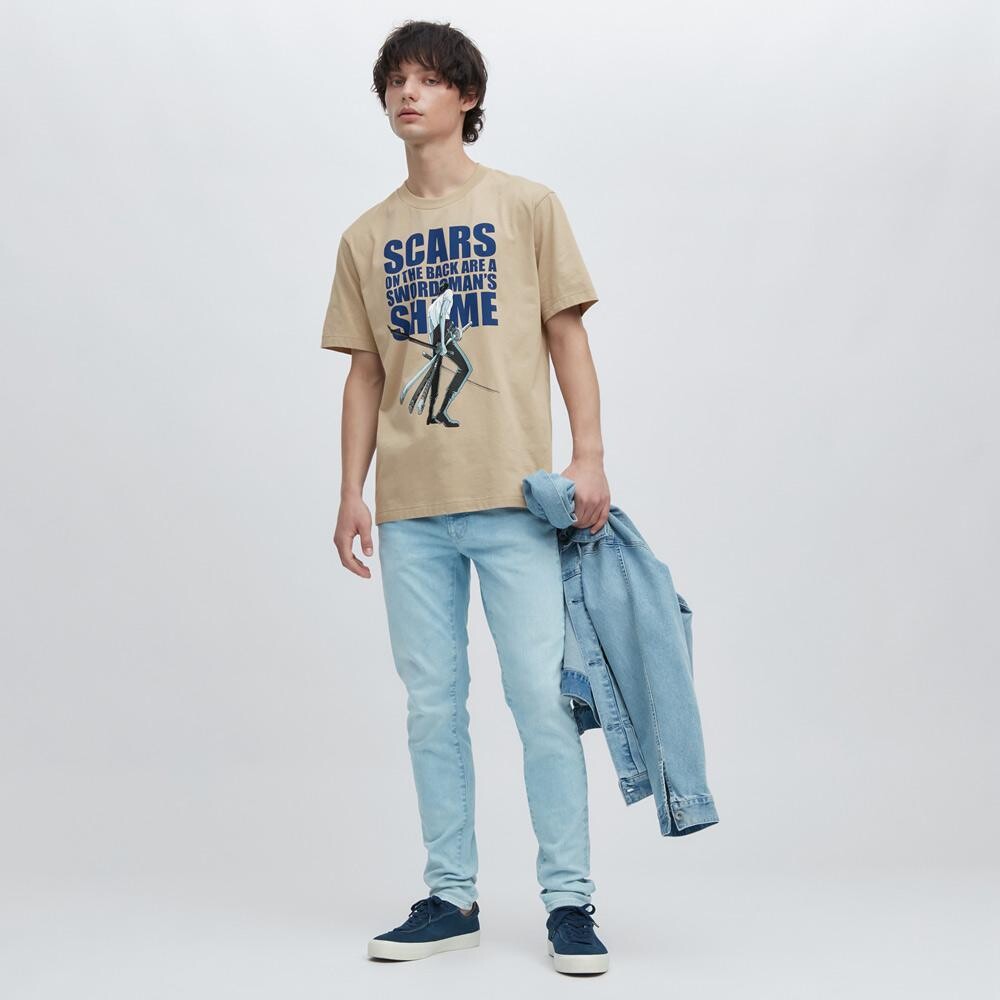 

Футболка с принтом унисекс Uniqlo, бежевый