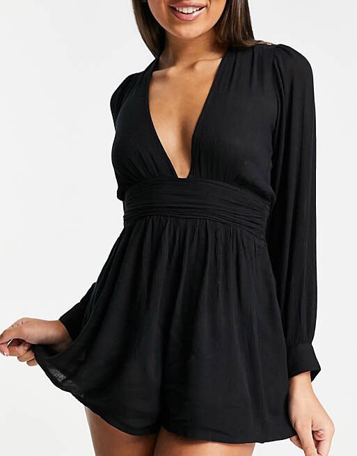 

Черный пляжный комбинезон с глубоким вырезом и длинными рукавами ASOS DESIGN