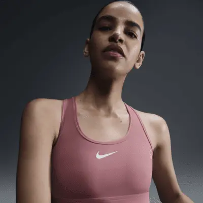 

Спортивный бюстгальтер Nike Swoosh Medium Support, цвет Canyon Pink/White