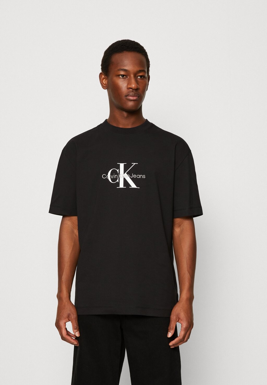 

Футболка с принтом Calvin Klein Jeans, черный