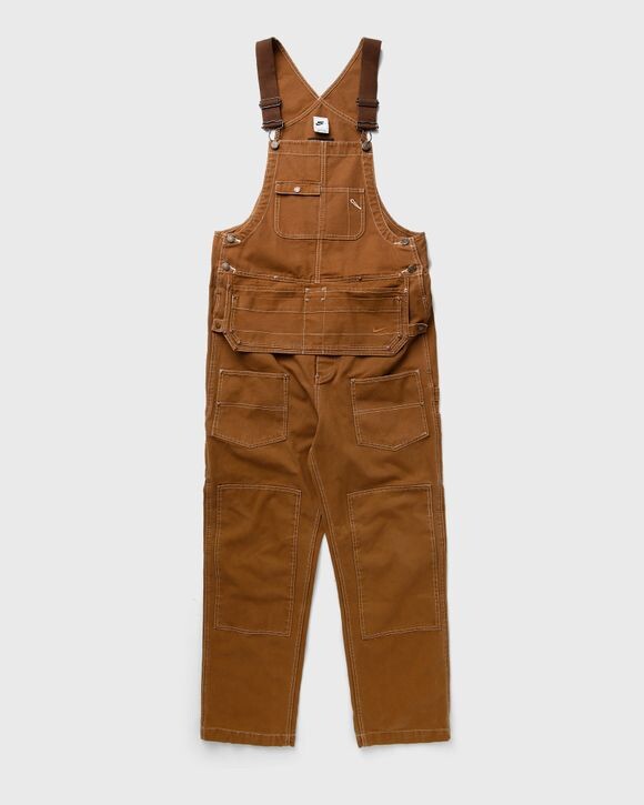 

Брюки Nike M Nl Carpenter Overall, цвет lt british tan/cacao wow