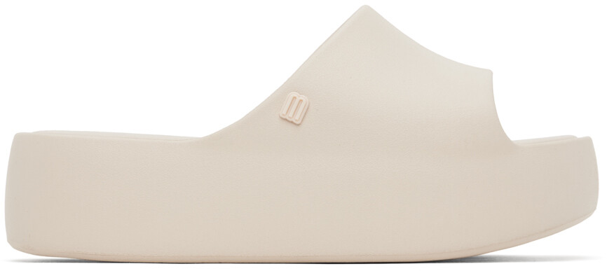 

Бежевые шлепанцы на платформе Free Melissa