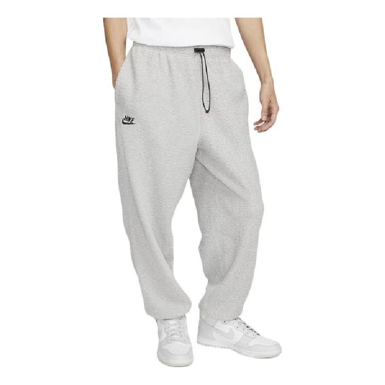 

Спортивные брюки Nike Sportswear Lined Winterized, светло-серый
