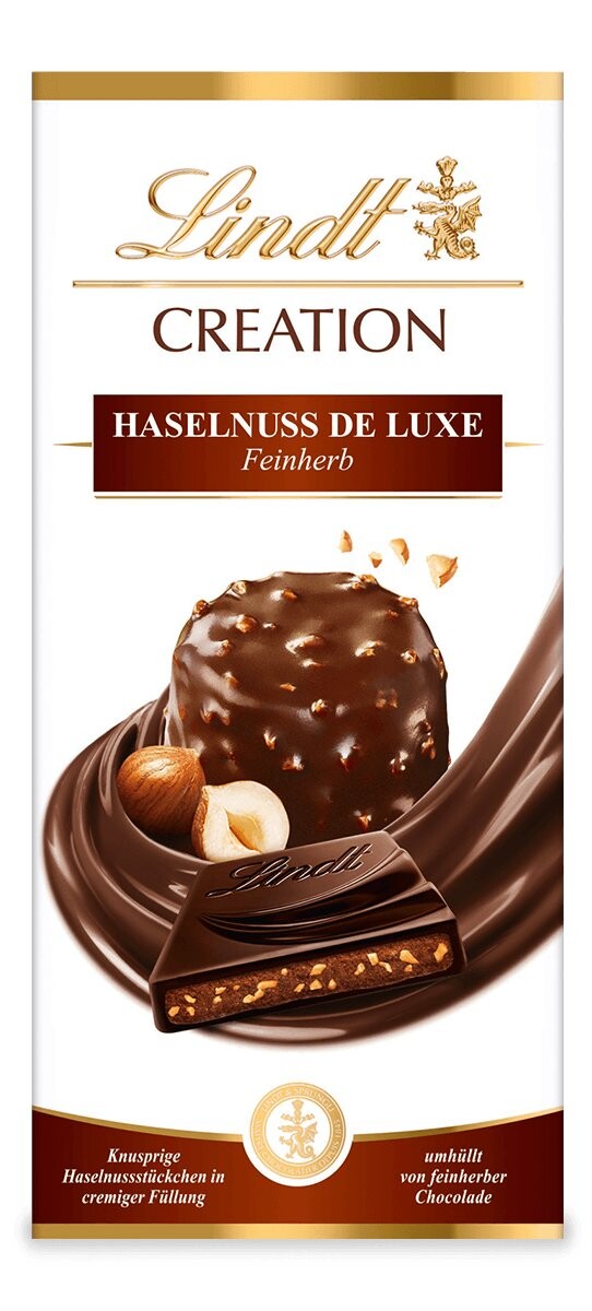 

Темный шоколад Lindt Creation Haselnuss De Luxe Feinherb, фундук, 150г