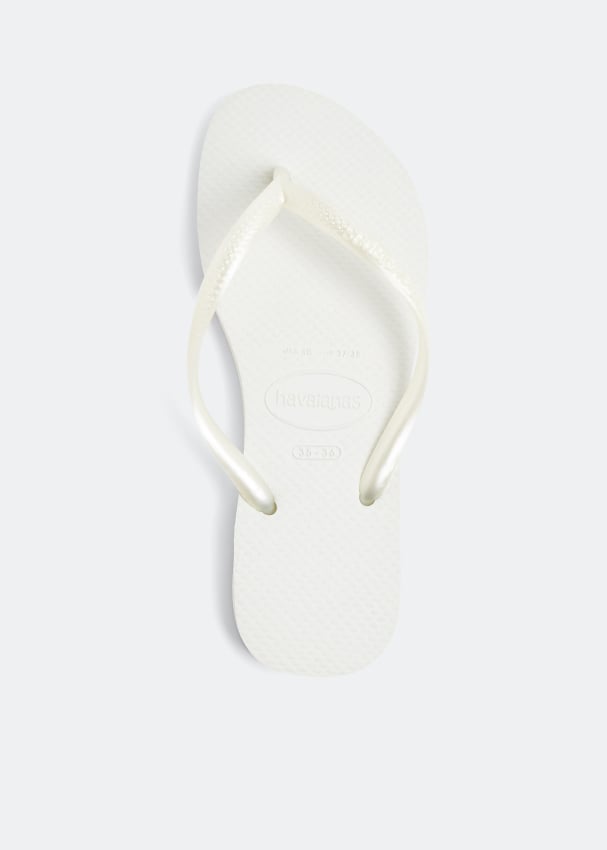 Шлепанцы HAVAIANAS Rubber flip flops, белый цена и фото