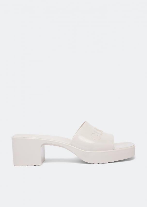 

Мюли GUCCI Logo-embossed rubber mules, белый
