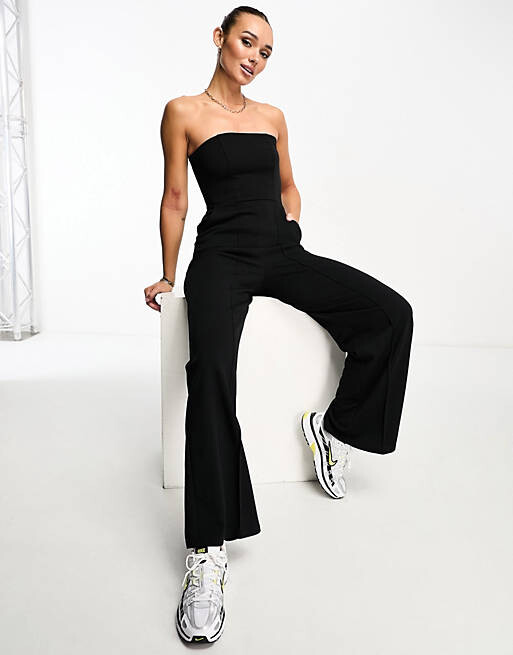 

Черный комбинезон с корсетом без рукавов River Island
