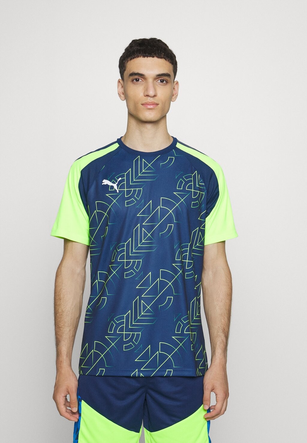 

Спортивная футболка TEAMLIGA GRAPHIC Puma, персидский синий/профессиональный зеленый