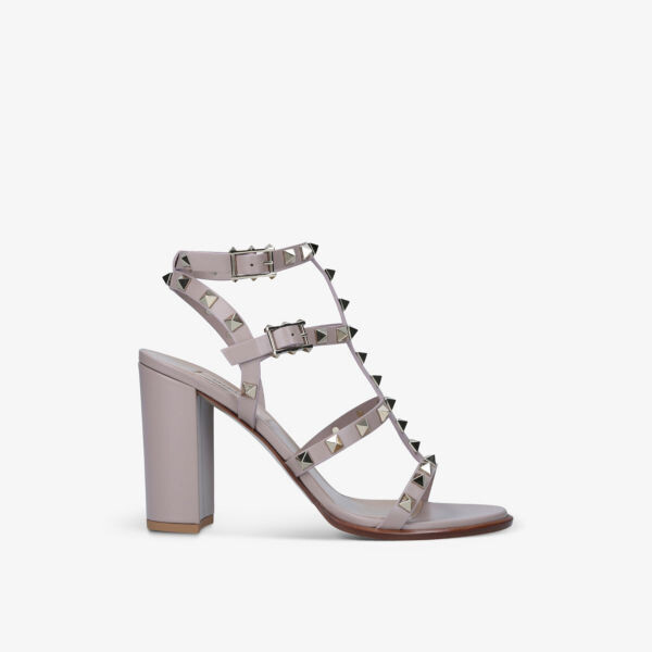 

Кожаные босоножки rockstud на каблуке с открытым носком Valentino Garavani, красный