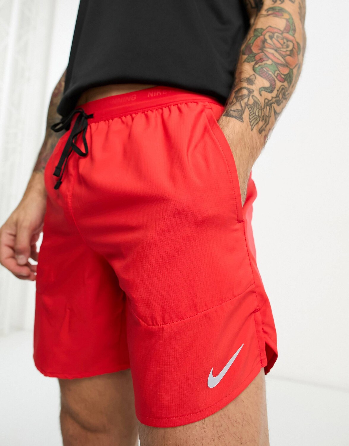 

Оранжевые 7-дюймовые шорты Nike Running Stride Dri-Fit