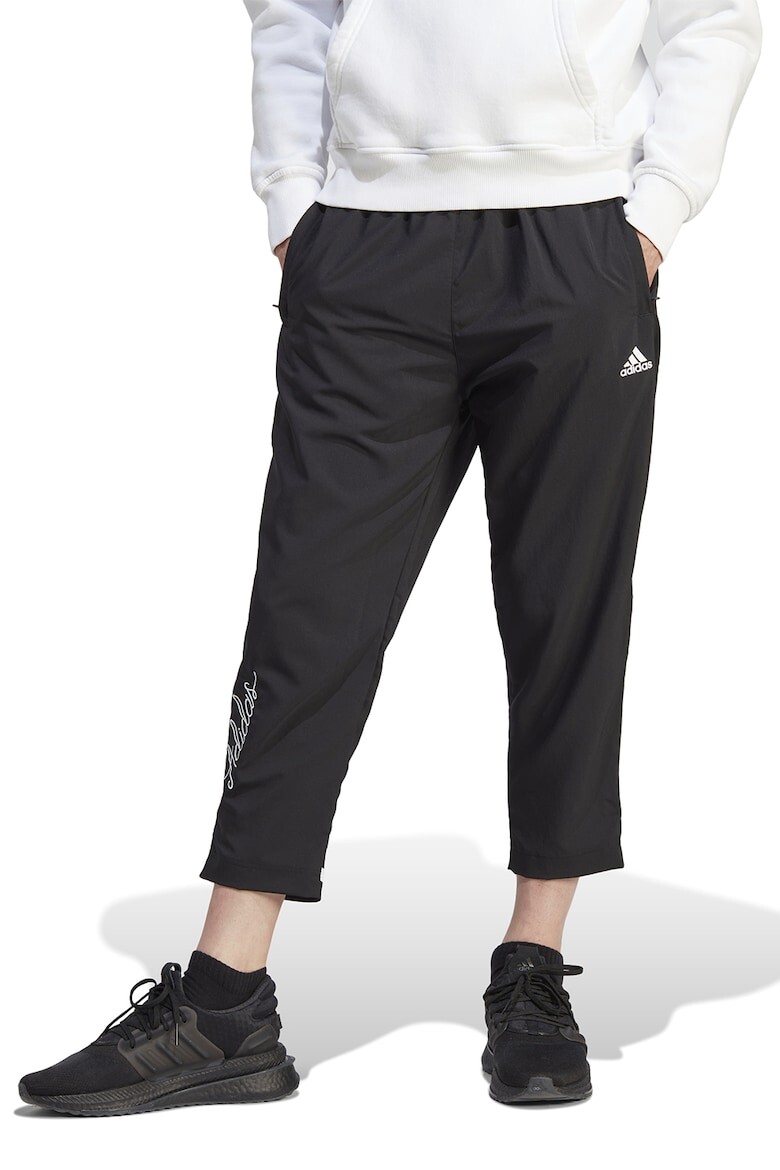 

Брюки выше щиколотки с боковыми карманами Adidas Sportswear, черный