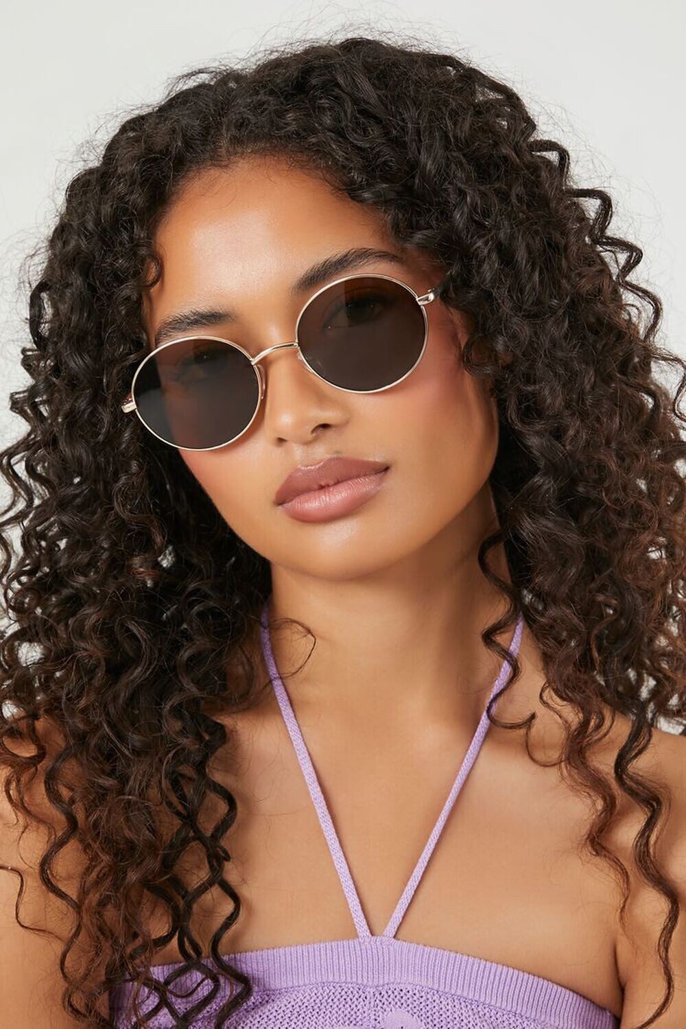 

Солнцезащитные очки в круглой оправе Forever 21, золотой