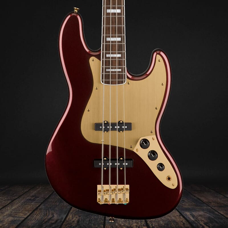 

Squier 40th Anniversary Jazz Bass, Gold Edition, Laurel Fingerboard - Ruby Red Metallic Precision Bass