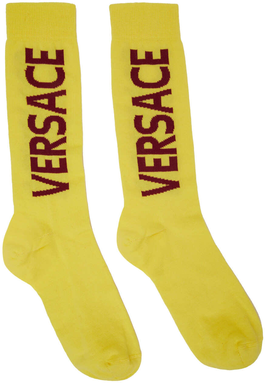 

Желтые носки с логотипом Versace
