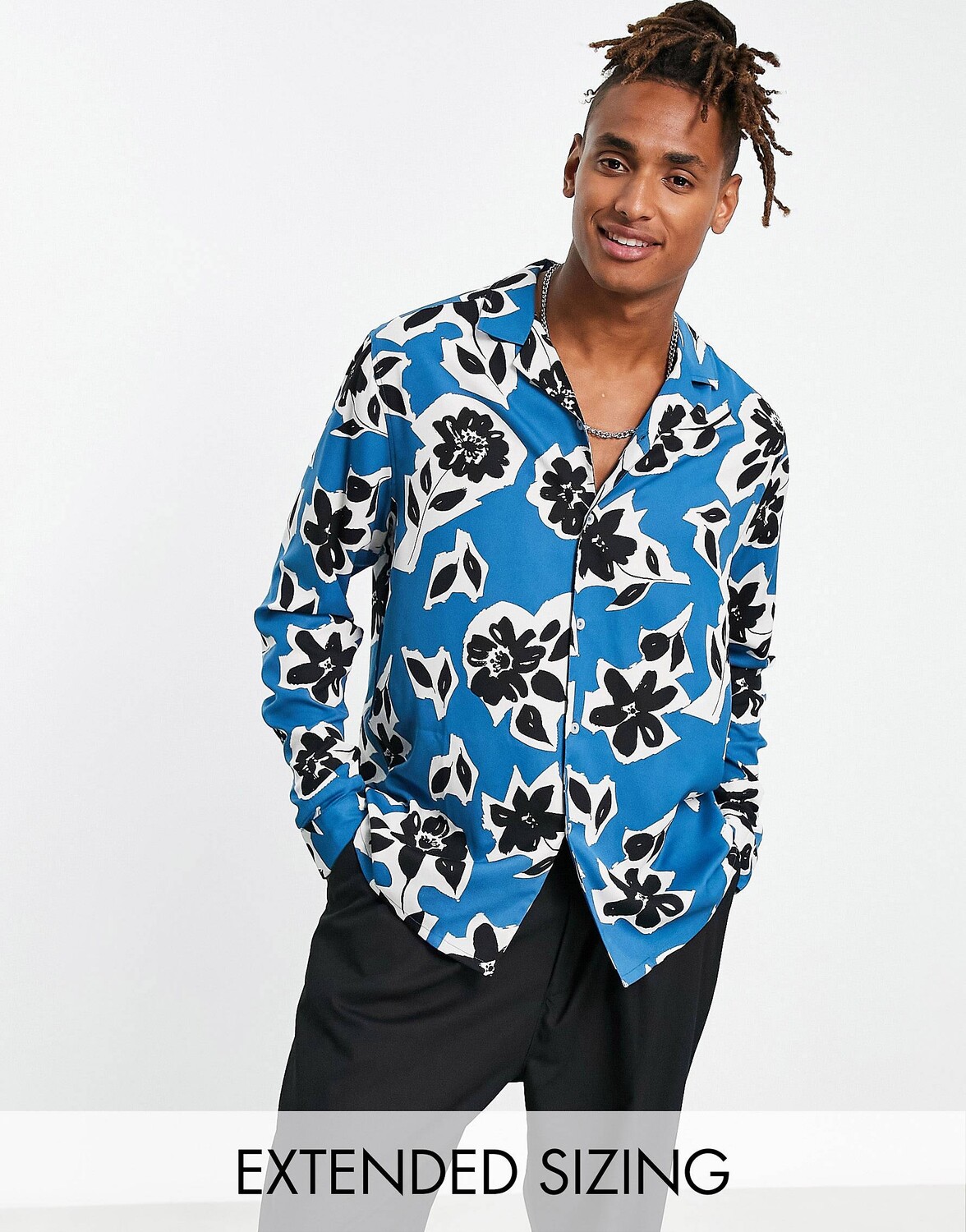 

Синяя свободная рубашка с цветочным принтом ASOS DESIGN