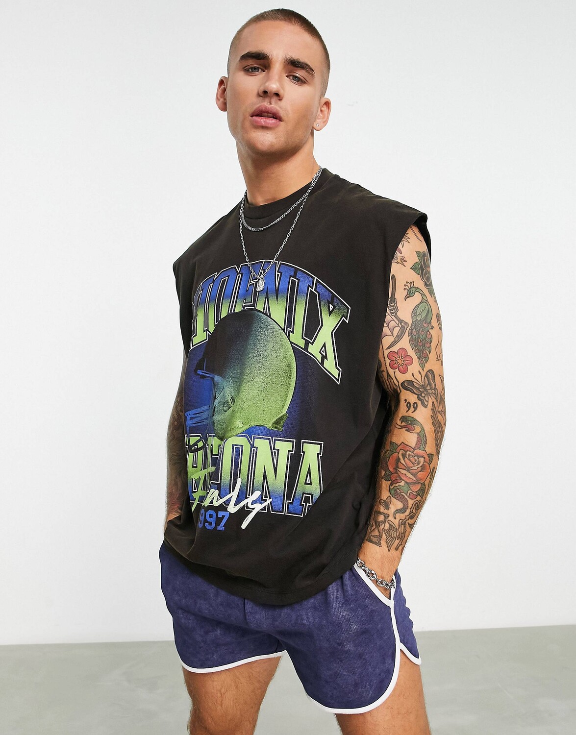 

Черный свободный жилет с бейсбольным принтом спереди ASOS DESIGN
