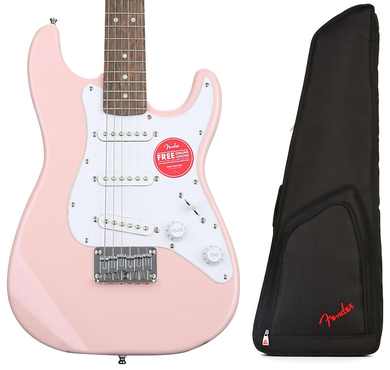 

Squier Mini Strat Electric Guitar - Shell Pink с лавровым грифом в комплекте с Fender FEMS-610 Mini Strat Gig Bag - черный Squier + Fender 0370121556=1 0991411206=1