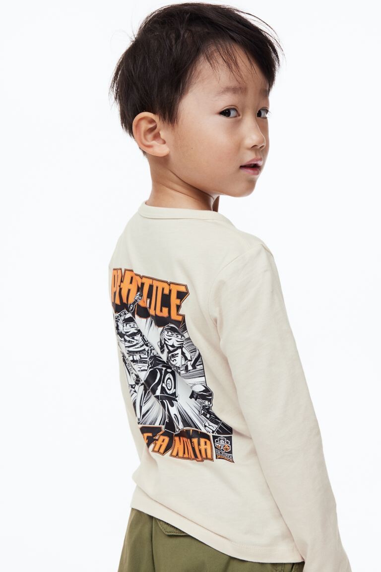 

Топ из хлопкового джерси с принтом из двух частей H&M Ninjago, бежевый/темно-синий