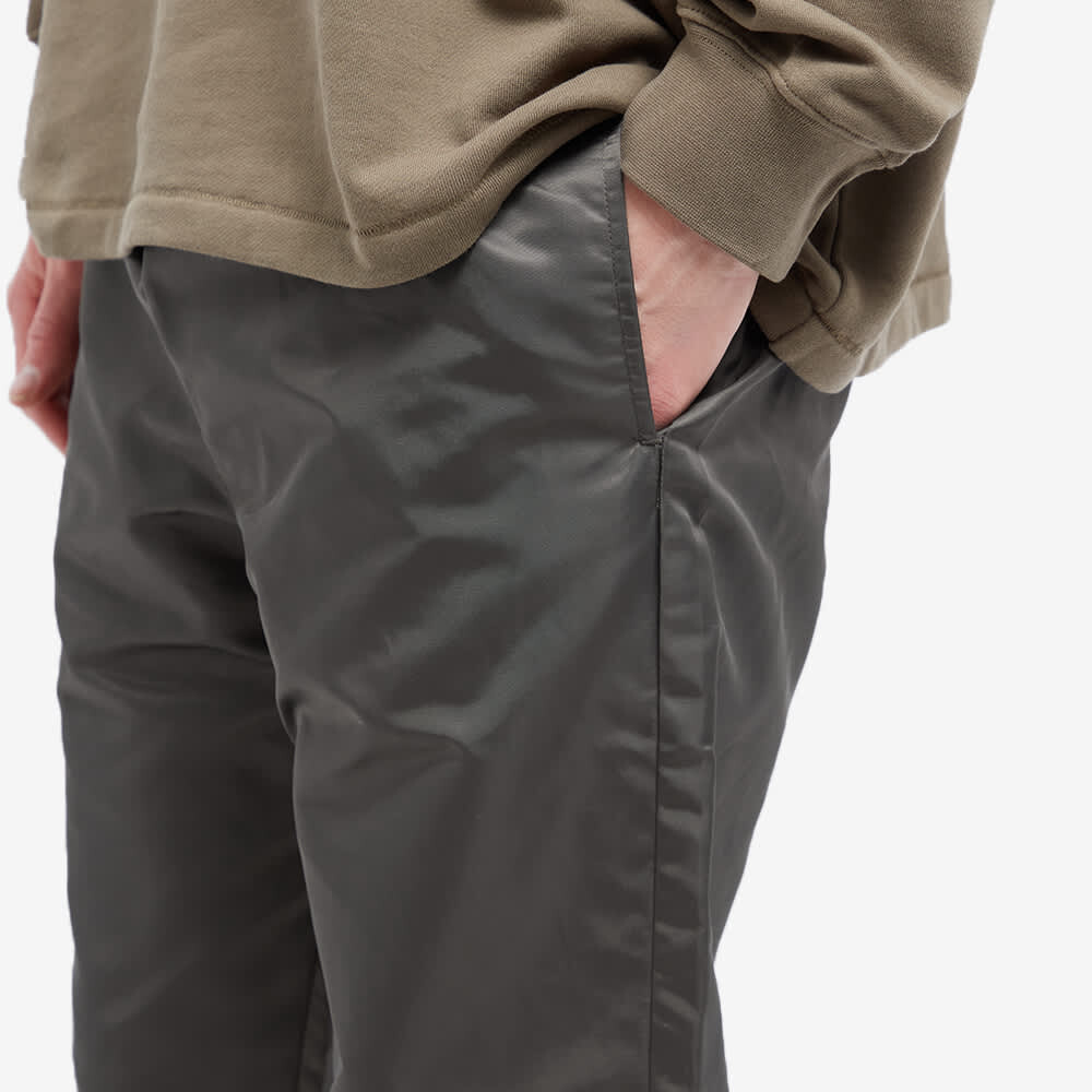 

Нейлоновые спортивные брюки с логотипом Fear of God ESSENTIALS