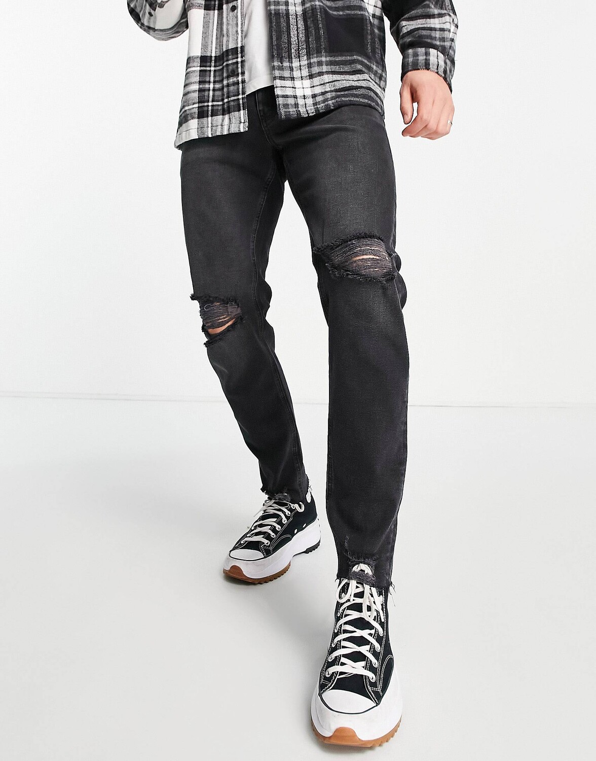 

Черные эластичные зауженные джинсы с прорезами ASOS DESIGN