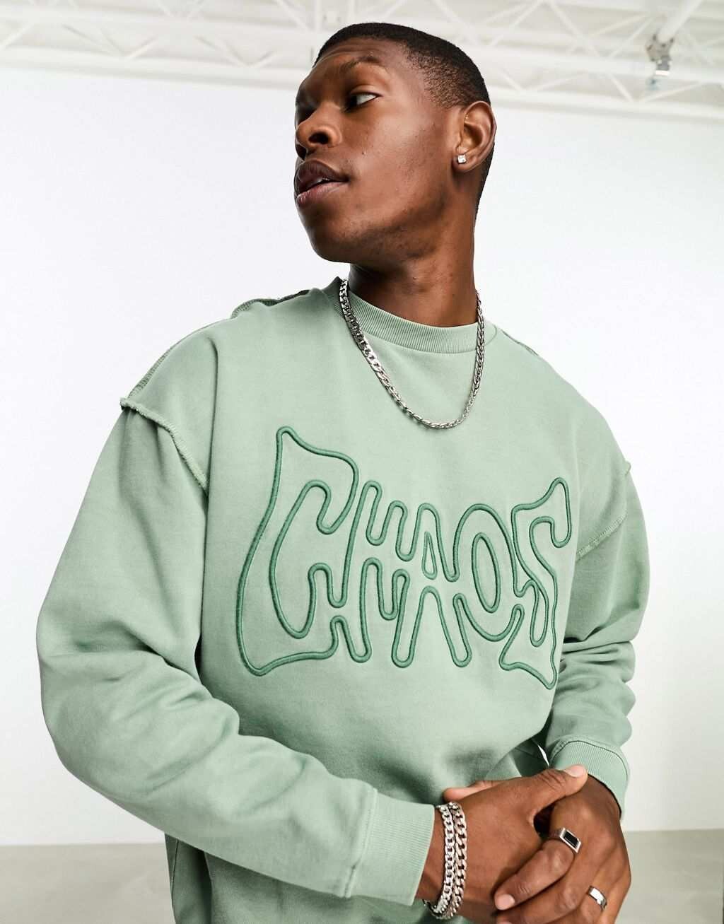 

Зеленый свитшот оверсайз с вышивкой города Берлина ASOS DESIGN