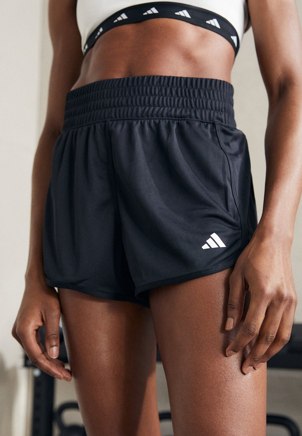 цена Спортивные шорты adidas Performance PACER HIGH, черный