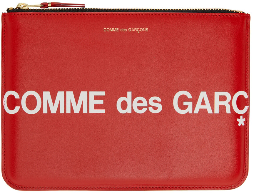 

Красный большой мешочек с огромным логотипом Comme des Garçons Wallets