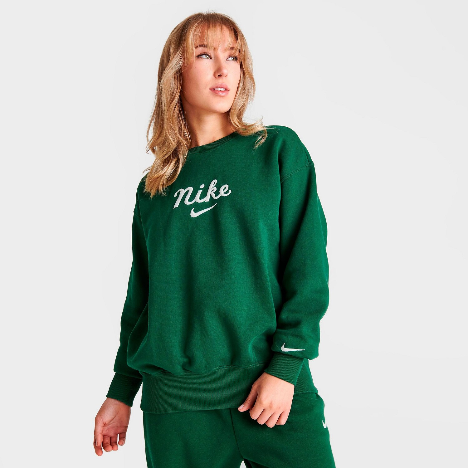 

Женская толстовка Nike Varsity с круглым вырезом, зеленый