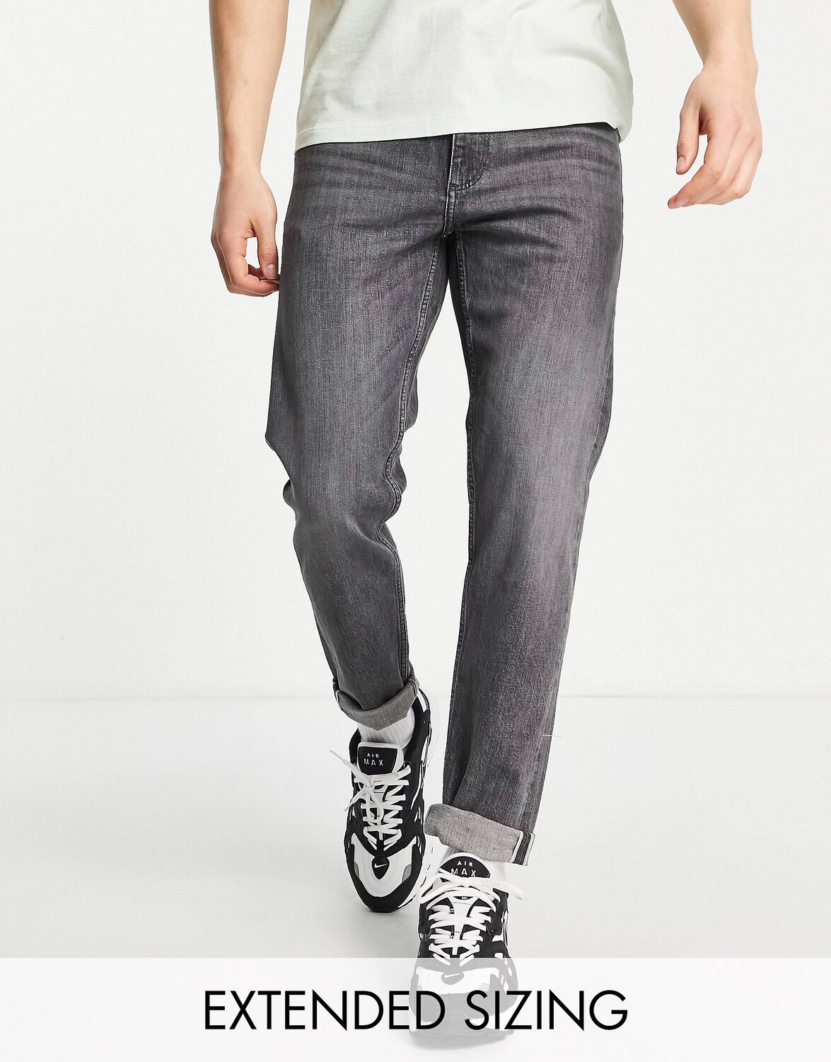 

Черные зауженные джинсы стрейч из денима с кромкой ASOS DESIGN