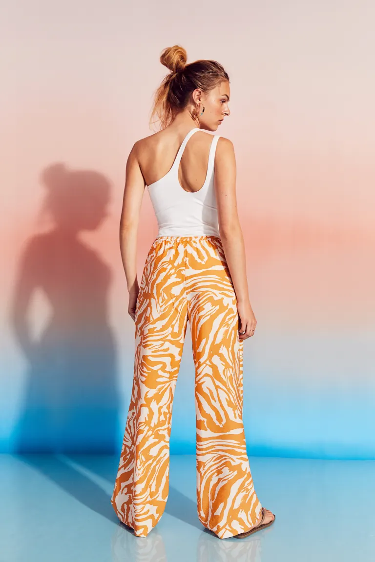 Широкие атласные брюки H\u0026M, светло-оранжевый/узор – купить с доставкойиз-за рубежа через платформу «CDEK.Shopping»