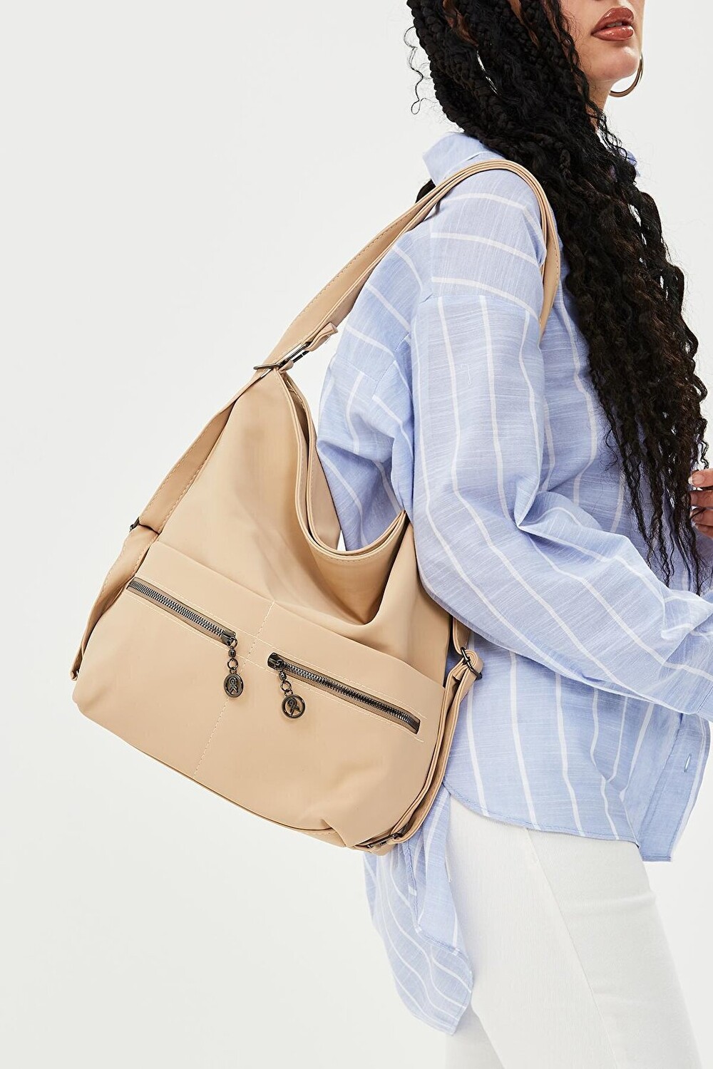 

Бежевая женская сумка Olivia Minebag
