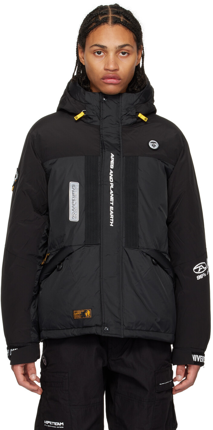 

Черный пуховик со вставками AAPE by A Bathing Ape