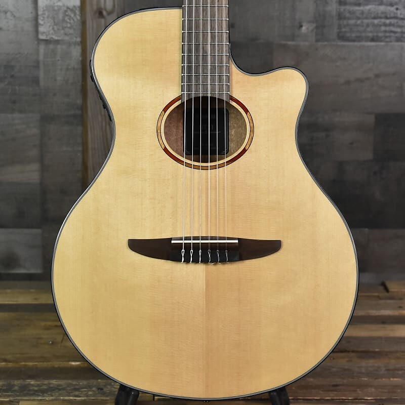 

Yamaha NTX1 Thinline Acoustic Electric Nylon String - Natural Yamaha NTX1 Thinline Electric Nylon String -