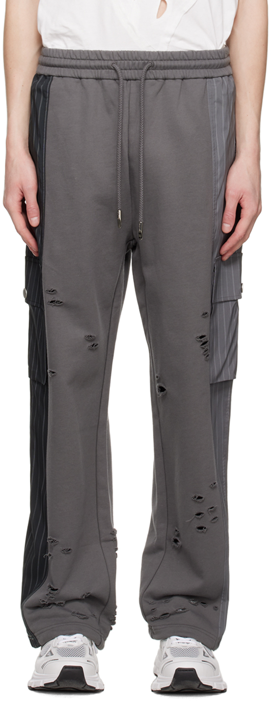 цена Серые брюки карго с контрастными карманами Feng Chen Wang