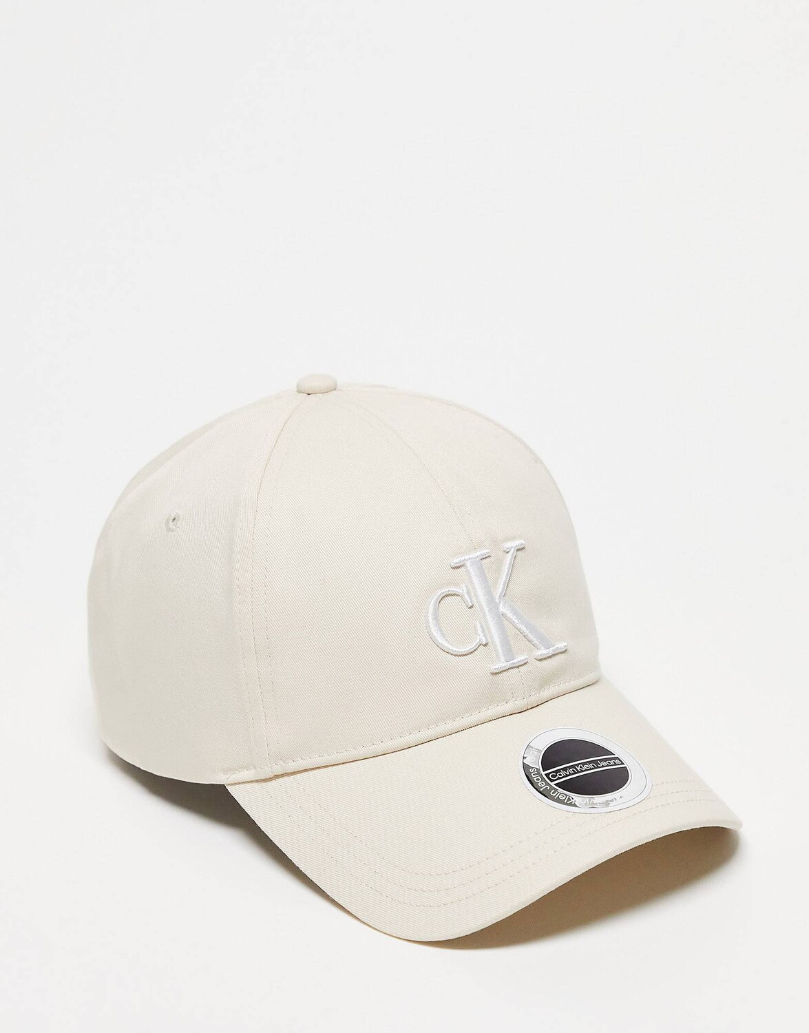 

Бежевая хлопковая кепка с монограммой и логотипом Calvin Klein Jeans