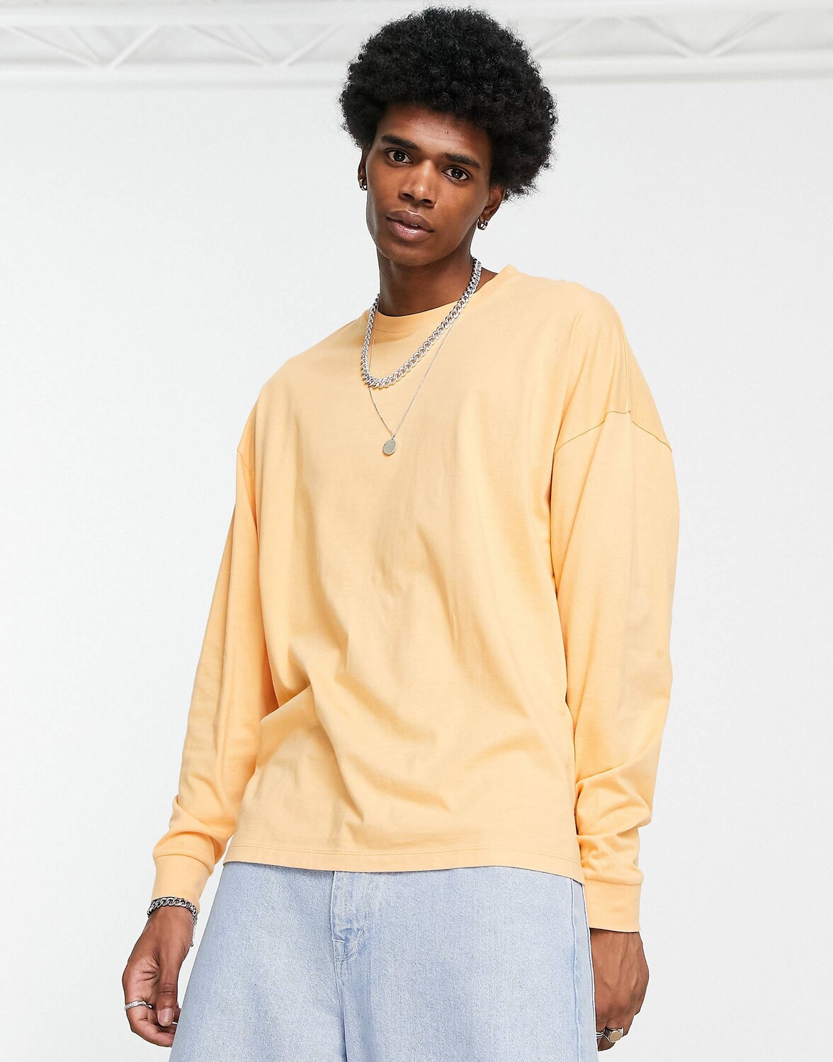 

Абрикосовая футболка оверсайз с длинными рукавами ASOS DESIGN