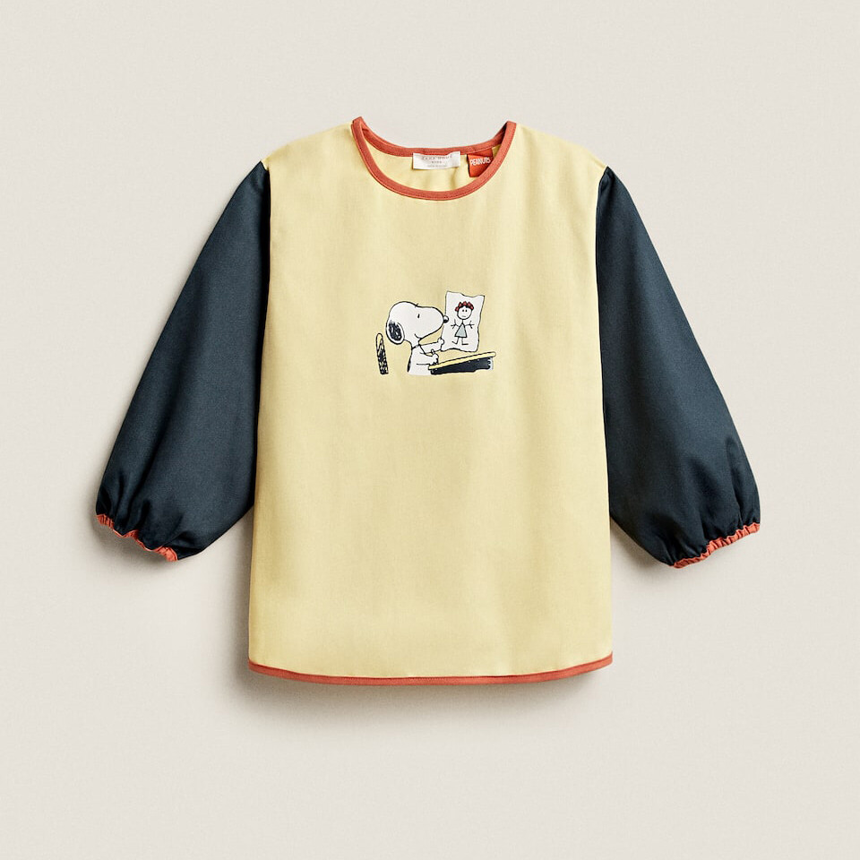 

Хлопковый нагрудник с рукавами Zara Home Peanuts, желтый/синий