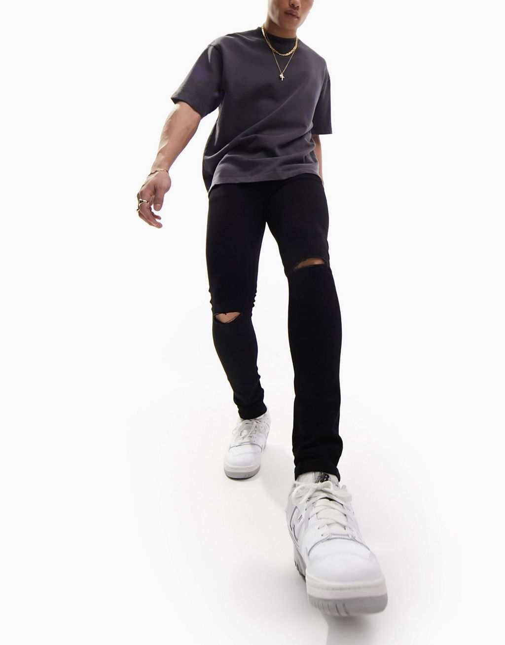 

Черные эластичные джинсы с прорезями на коленях ASOS DESIGN