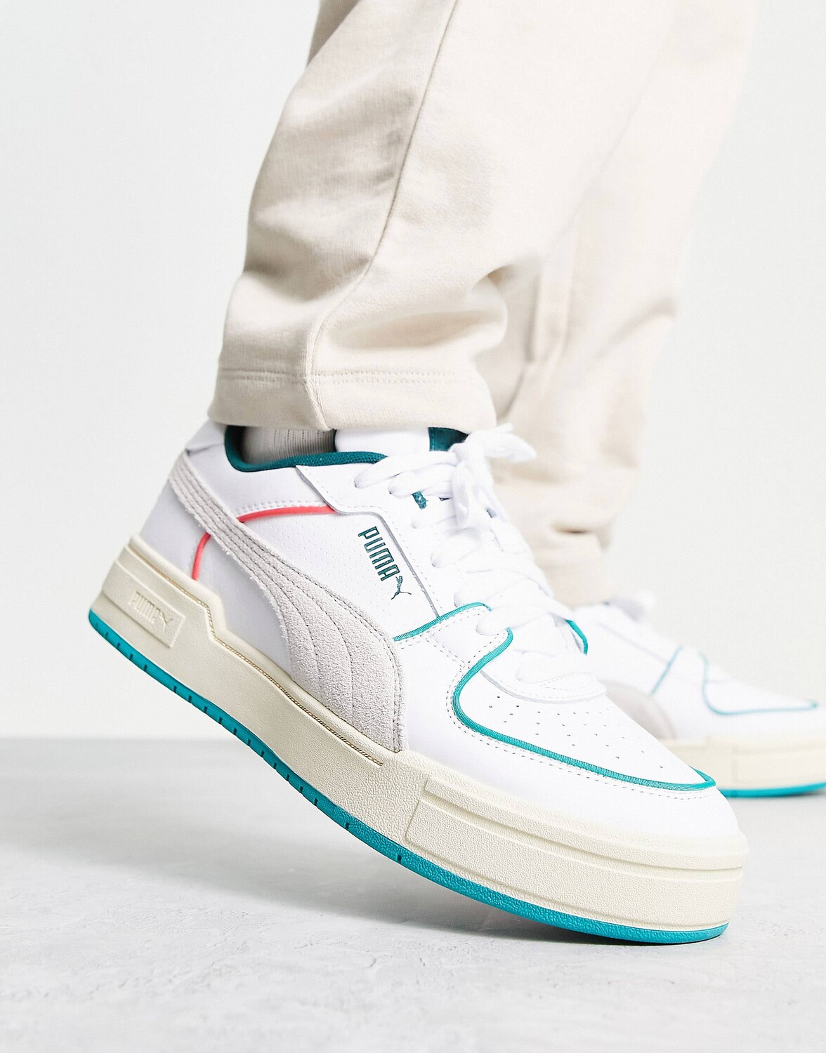 

Белые кроссовки Puma CA Pro в стиле ретро с цветными деталями