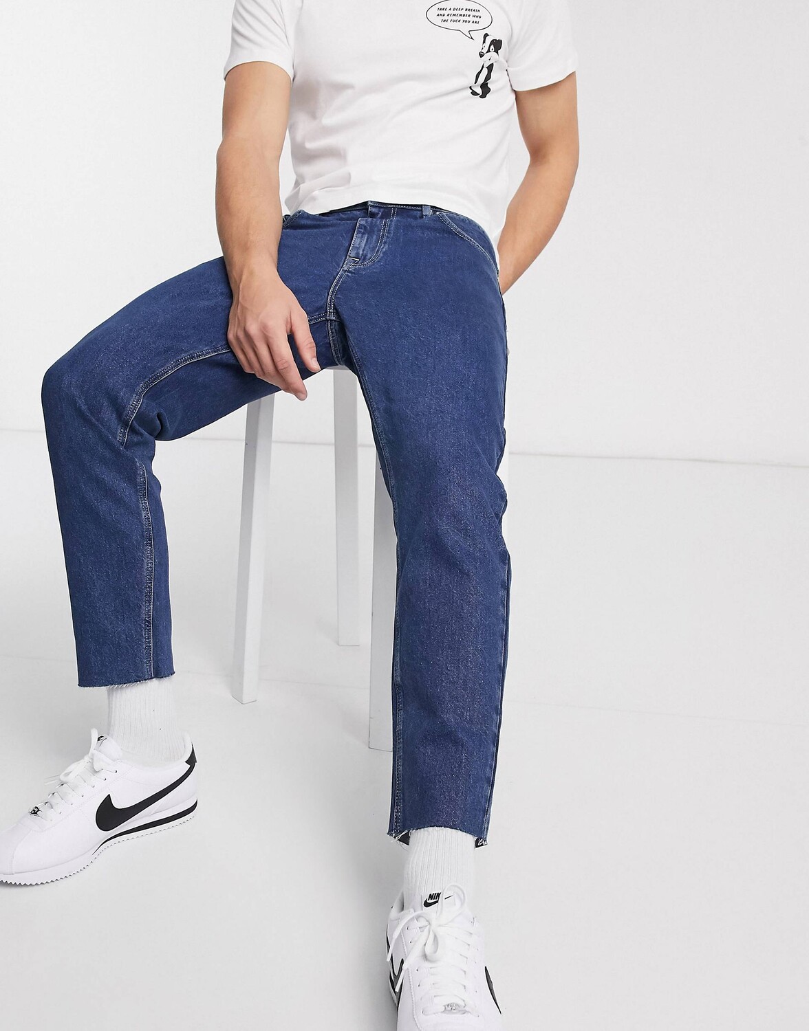 

Классические синие джинсы с необработанными краями ASOS DESIGN