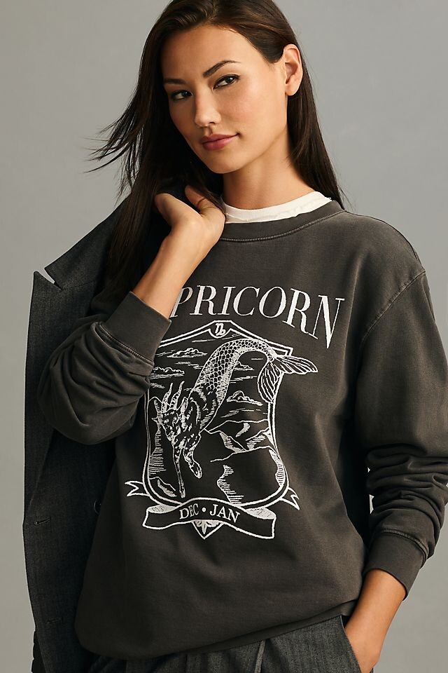

Толстовка Girl Dangerous x Anthropologie Zodiac Collegiate с принтом козерога, черный