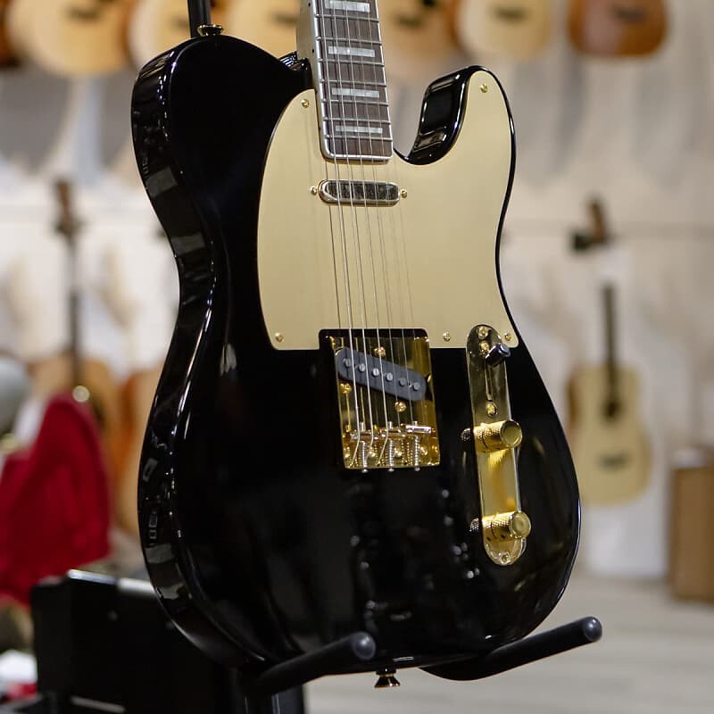 

Squier 40th Anniversary Telecaster Gold Edition - Laurel Fingerboard - Black SQ 40 TELE LRL GHW GPG BLK