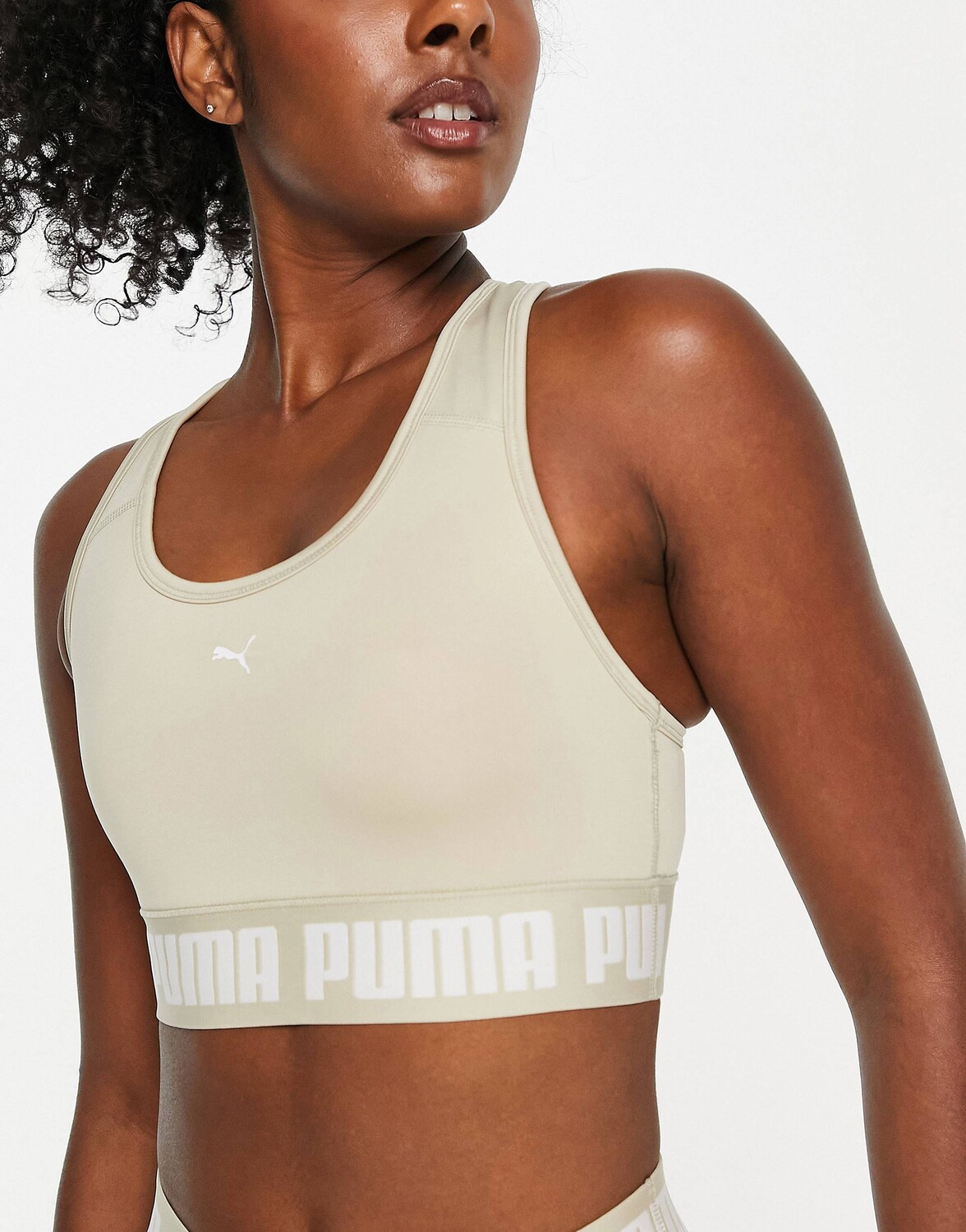

Спортивный бюстгальтер со средней поддержкой Puma Training Strong из камня