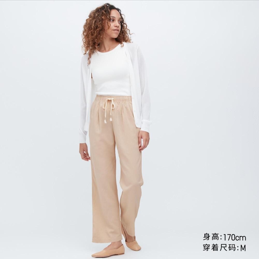 

Эластичные брюки Uniqlo, бежевый